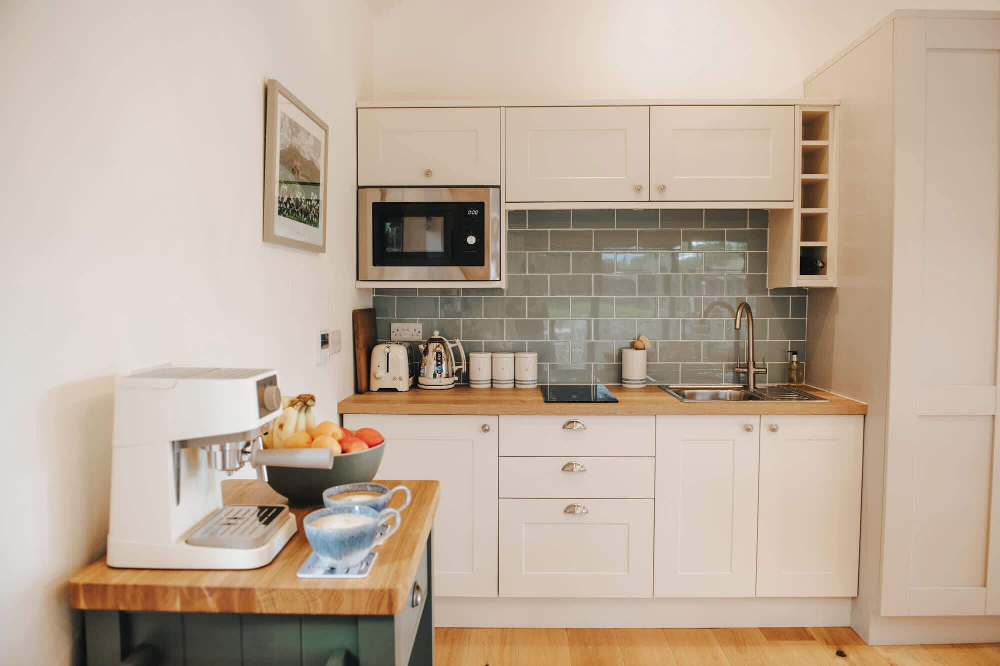 Fridge, microwave, stovetop, coffee/tea maker