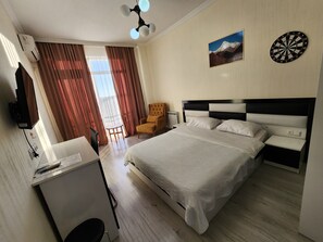 Standard Double Room, Balcony, City View | 1 bedroom, desk, laptop workspace, blackout drapes