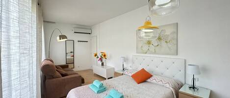 Double Room, Shared Bathroom, City View | Iron/ironing board, free WiFi, bed sheets
