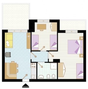 Plano de un cuarto de hotel con kitchenette, baño y sala de estar.