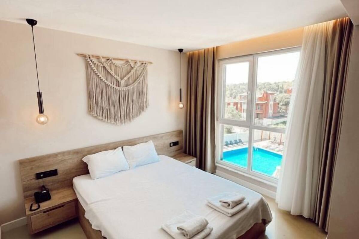 Premium bedding, down duvets, pillow-top beds, in-room safe