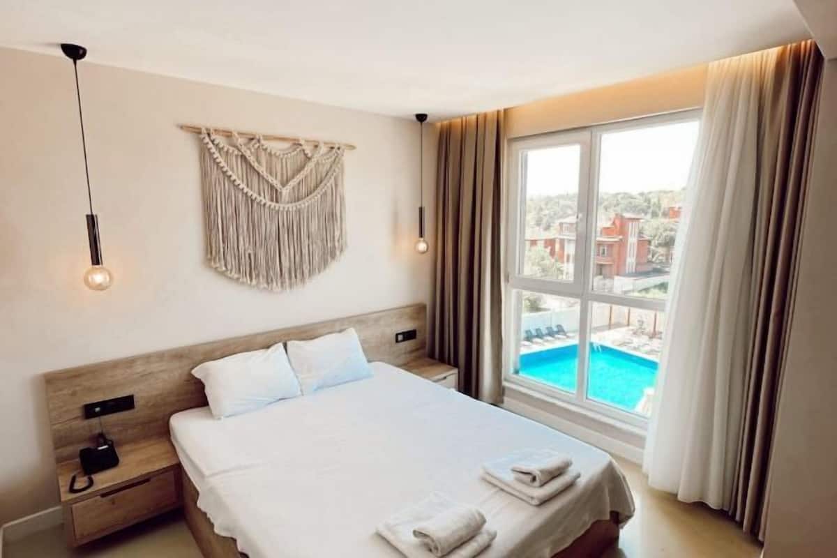Premium bedding, down duvets, pillow-top beds, in-room safe