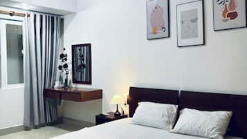 Double Room, City View | Iron/ironing board, free WiFi