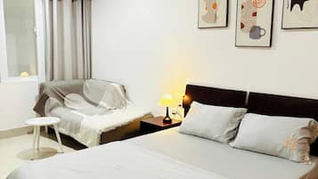 Double Room, City View | Iron/ironing board, free WiFi