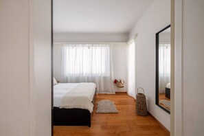 1 bedroom, desk, iron/ironing board, travel cot