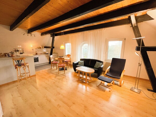 Panoramic Condo, Garden View | Living area | 100-cm flat-screen TV with satellite channels