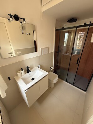 Double Room, Balcony, Sea View | Bathroom | Shower, hair dryer, towels, soap