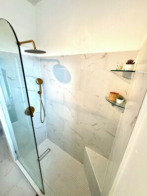 Shower, eco-friendly toiletries, hair dryer, towels