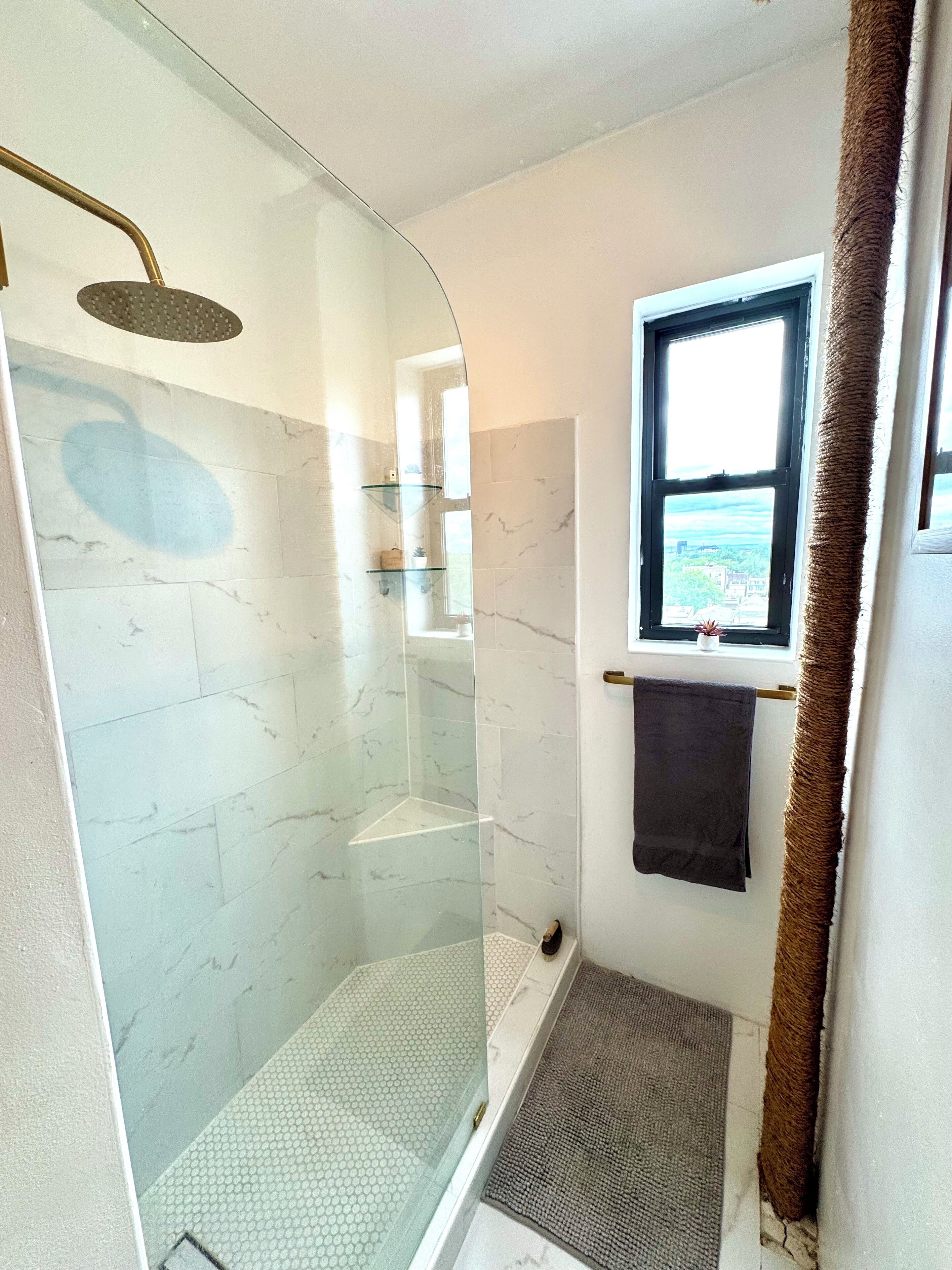 Shower, eco-friendly toiletries, hair dryer, towels