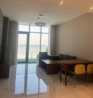 Living area - EC Holiday Homes Dubai Al Furjan (Dubai)