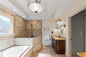 Shower, jetted bath, towels