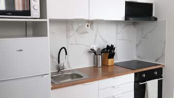 Een magnetron, een oven, een kookplaat