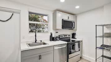 Deluxe Condo, 2 Bedrooms, Non Smoking, Patio | Private kitchen | Full-size fridge, microwave, oven, stovetop