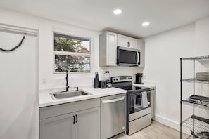 Deluxe Condo, 2 Bedrooms, Non Smoking, Patio | Private kitchen | Full-sized fridge, microwave, oven, stovetop