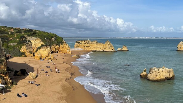 A beach with rocky formations and a clear sky. - 7 Degrees South, Luxurious 2 Bedroom Marina Water Side Apartment (lagos)