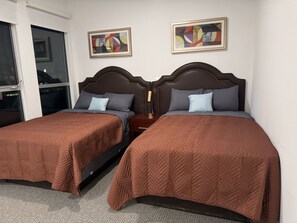 Departamento Deluxe, 3 habitaciones | Ropa de cama de alta calidad y camas con pillow-top 