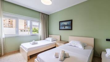 2 slaapkamers, een strijkplank/strijkijzer, gratis wifi, beddengoed