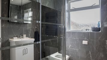 Hair dryer, towels, soap, toilet paper