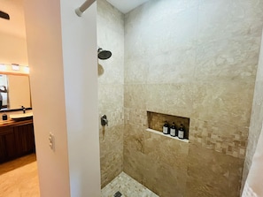 Shower, hair dryer, towels, soap