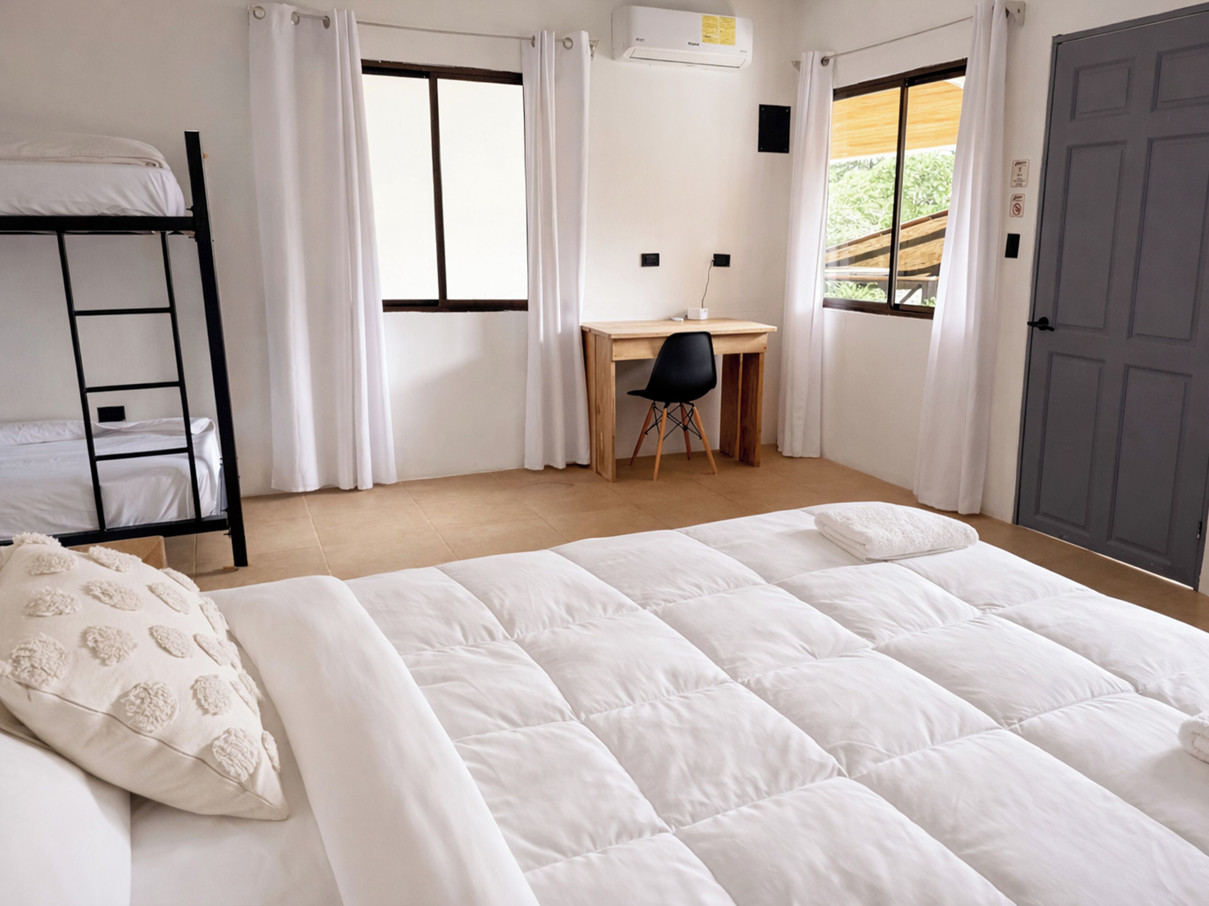 Comfort Room, Garden View | In-room safe, desk, laptop workspace, blackout drapes