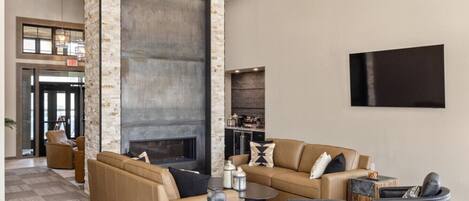 Smart TV, fireplace, books, stereo