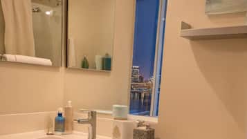 Deluxe Apartment, 2 Bedrooms | Bathroom | Combined shower/bathtub, hair dryer, towels, soap