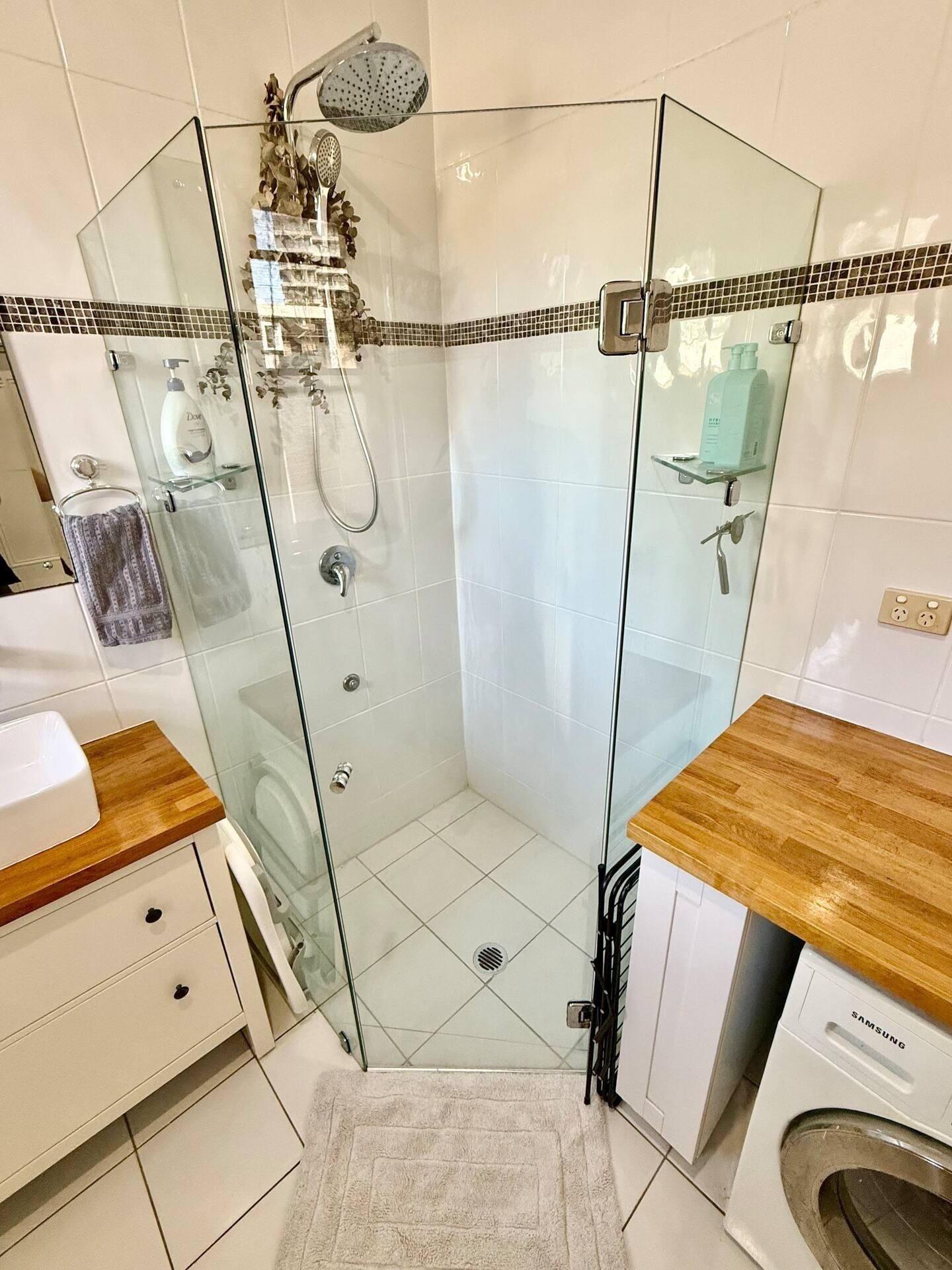 Shower, hair dryer, towels, soap