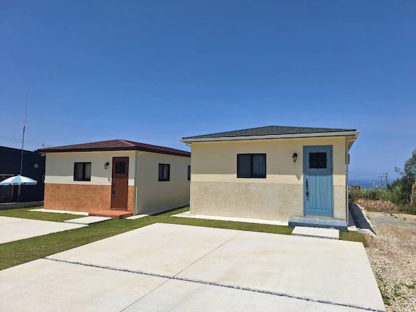 Villa, vista al océano | 1 habitación, cortinas blackout, wifi gratis y ropa de cama 
