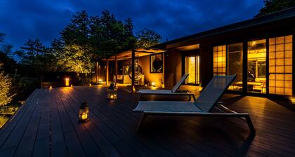 Private sauna and open-air hot spring bath.