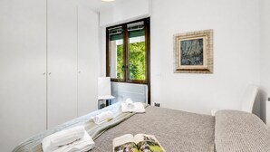 2 dormitorios, tabla de planchar con plancha, wifi gratis y ropa de cama