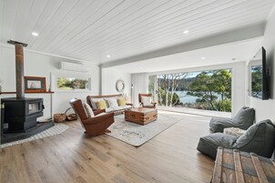 Casa Deluxe, vistas a la bahía | Zona de estar