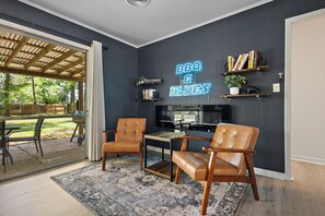 Smart TV, fireplace, books