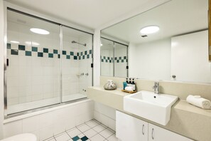 Shower, hair dryer, towels, soap