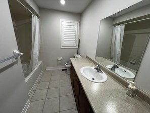 Bidet, towels, soap, toilet paper