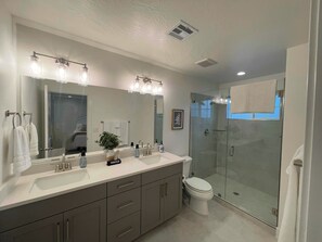 Shower, hair dryer, towels, soap