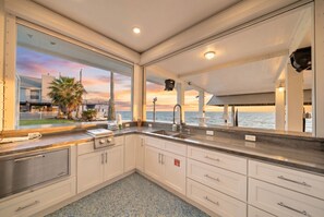 Fridge, microwave, oven, stovetop - Stunning Waterfront Home with Private Pool (Galveston)