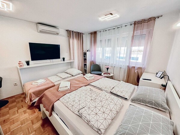 1 dormitorio, tabla de planchar con plancha, wifi gratis y ropa de cama