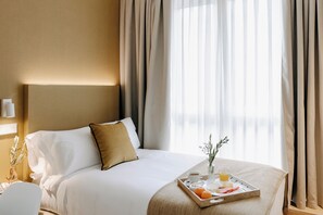 Einzelzimmer | Zimmersafe, schallisolierte Zimmer, Bügeleisen/Bügelbrett