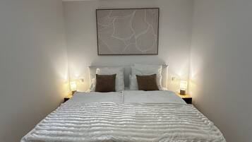 2 bedrooms, iron/ironing board, WiFi, bed sheets