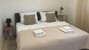 2 chambres, fer et planche à repasser, Wi-Fi, draps fournis