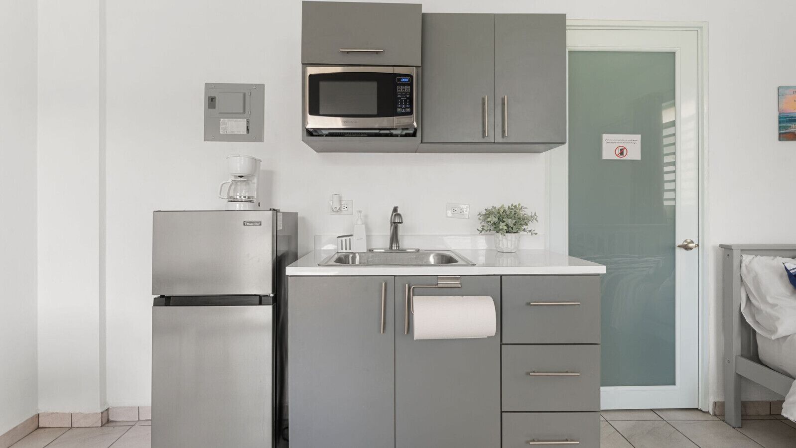 Fridge, microwave, coffee/tea maker, dining tables