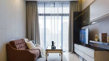 Two-Bedroom Suite | Living area | 42-inch Smart TV with cable channels, Netflix, streaming services