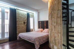2 slaapkamers, een strijkplank/strijkijzer, beddengoed