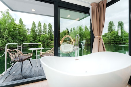 Panoramic Suite, 1 King Bed, Hot Tub, Lake View | Terrace/patio. L'Escale Royale St-Fargeau-Ponthierry
