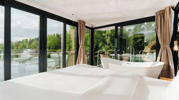 Panoramic Suite, 1 King Bed, Hot Tub, Lake View | Desk, laptop workspace, blackout drapes, free WiFi