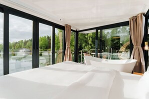 Panoramic Suite, 1 King Bed, Hot Tub, Lake View | Desk, laptop workspace, blackout curtains, free WiFi