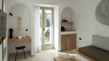 Suite Signature, vistas a la piscina | Zona de estar