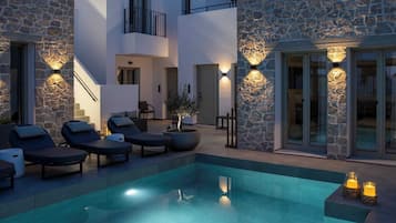 Suite Signature, balcón, vistas a la piscina | Vistas al jardín