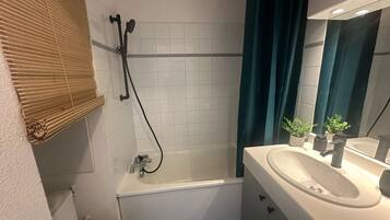 Hair dryer, towels, soap, toilet paper