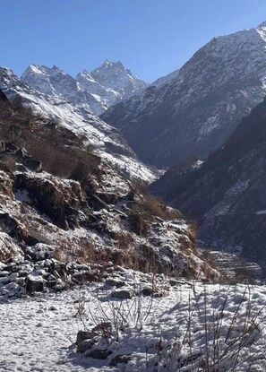 Surrounded by rugged mountain peaks and a serene valley, this breathtaking landscape offers a tranquil escape.